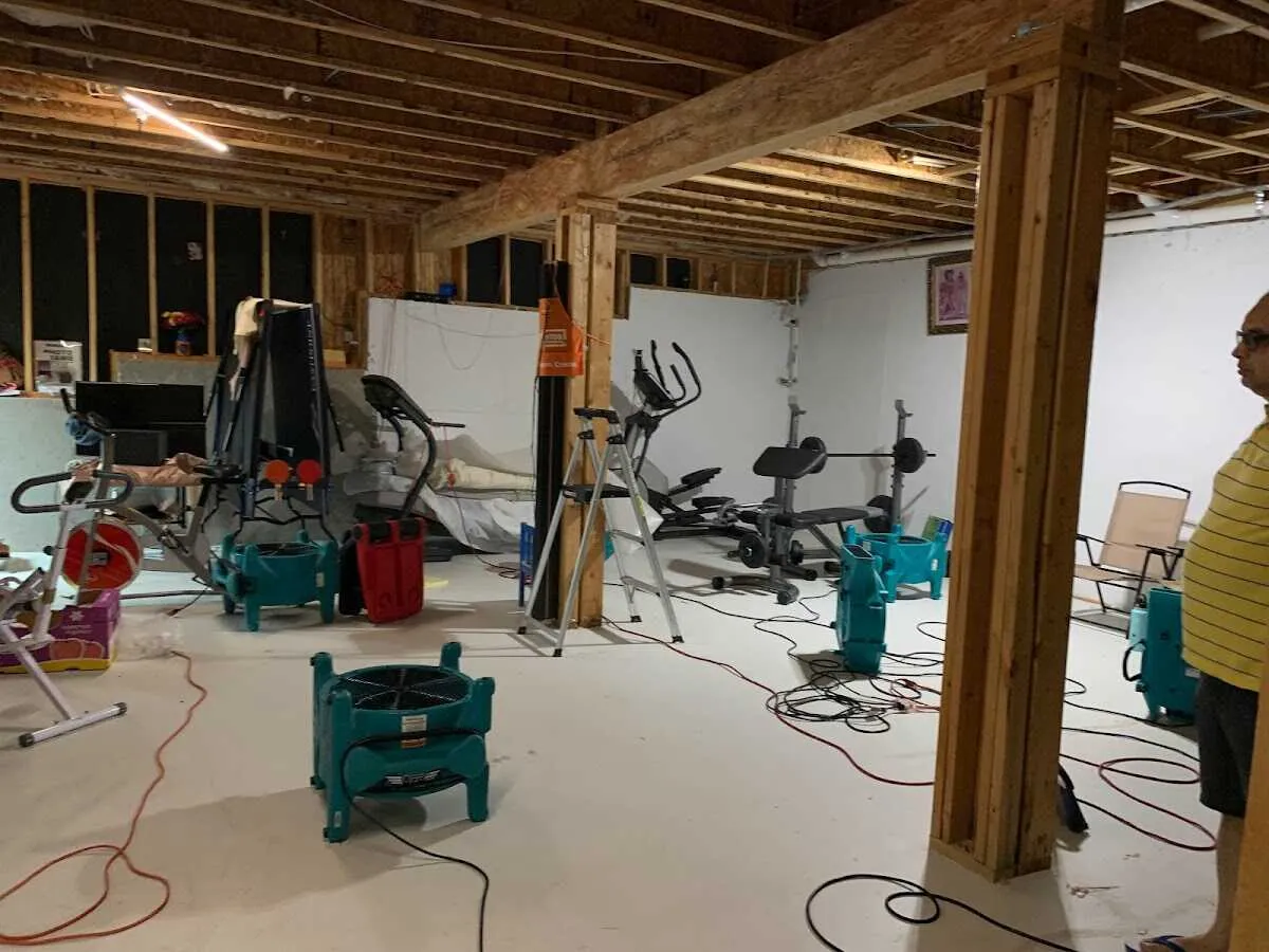 Basement drying equipment setup for Contents Cleaning & Restoration in East Niles